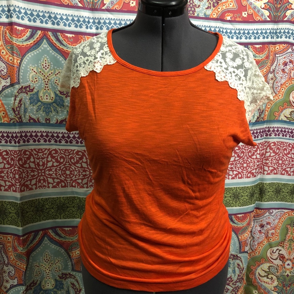 Orange shirt with white lacing